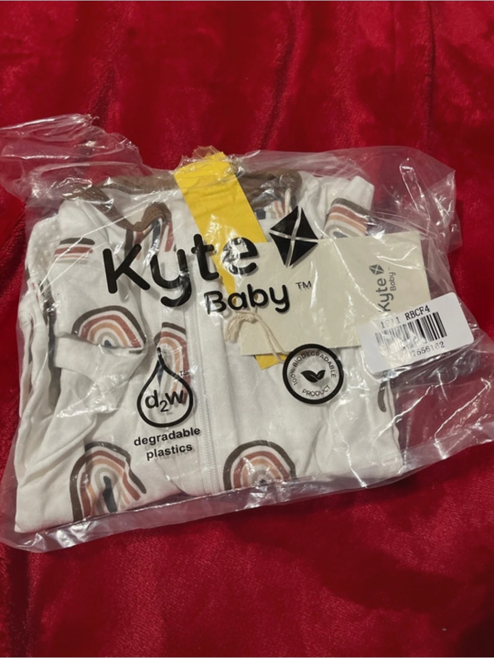 Kyte Baby White Zip Footie Tan & Neutral Rainbow Print